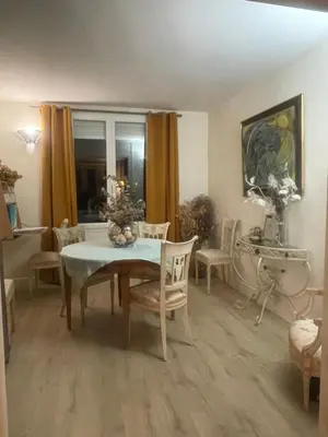 Coin salon dans l'établissement Chambre chez l'habitant