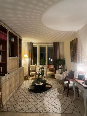 Coin salon dans l'établissement Chambre chez l'habitant