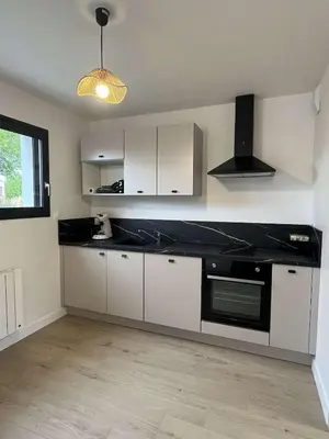 Cuisine ou kitchenette dans l'établissement Le Cottage