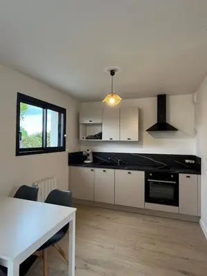 Cuisine ou kitchenette dans l'établissement Le Cottage