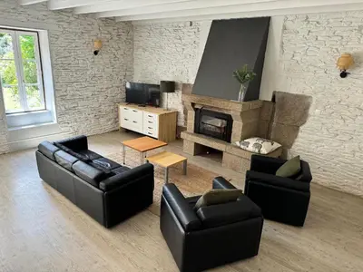 Coin salon dans l'établissement Apparthôtel Mont Saint Michel - Résidence Fleurdumont