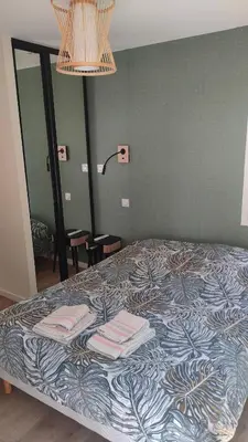 Un ou plusieurs lits dans un hébergement de l'établissement Maison bord de mer