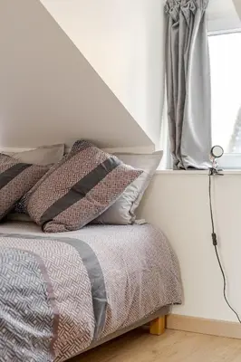 Un ou plusieurs lits dans un hébergement de l'établissement Bienvenue chez Marie et Guillaume