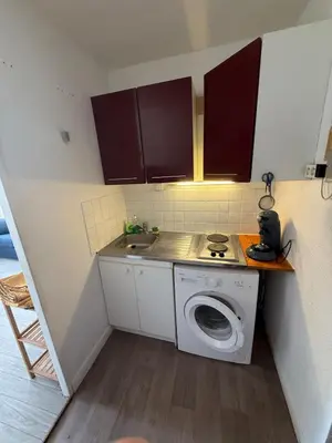 Cuisine ou kitchenette dans l'établissement Studio au cœur du village d'arts