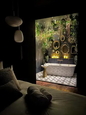Un ou plusieurs lits dans un hébergement de l'établissement Suite Romantique, hyper centre