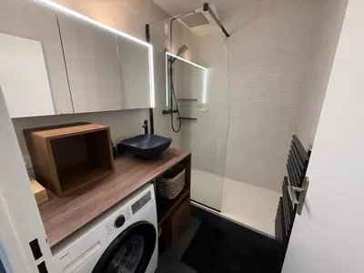 Cuisine ou kitchenette dans l'établissement Le Prisme