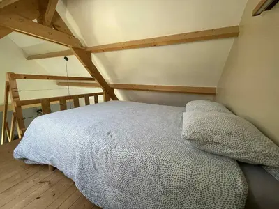 Un ou plusieurs lits dans un hébergement de l'établissement Le petit Chalet
