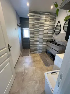 Salle de bains dans l'établissement Arlega