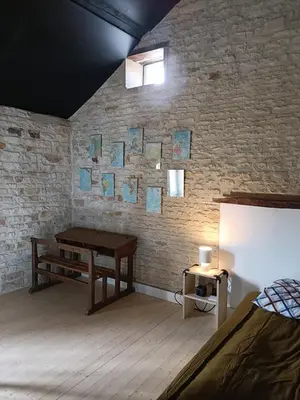 Coin salon dans l'établissement Le Seizième gîte 4 pers entre Caen et la mer