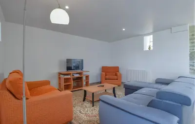 Coin salon dans l'établissement Maison De Charme Proche Mer