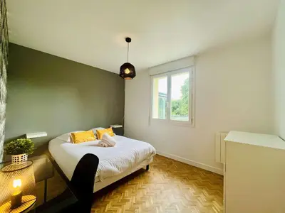 Un ou plusieurs lits dans un hébergement de l'établissement Le Logis des Pres Country Stay