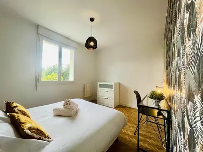 Un ou plusieurs lits dans un hébergement de l'établissement Le Logis des Pres Country Stay