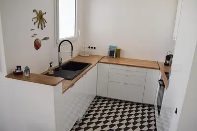 Cuisine ou kitchenette dans l'établissement Le Bain des Dames