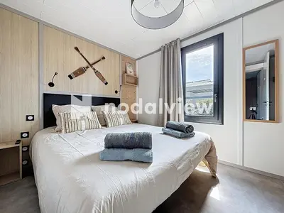 Un ou plusieurs lits dans un hébergement de l'établissement Cottage Le Béluga