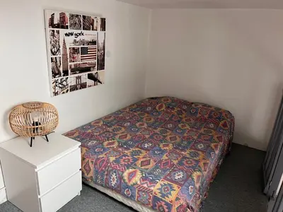 Un ou plusieurs lits dans un hébergement de l'établissement Appartement Cabourg Plage - F2 - Vue dégagée