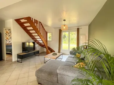 Un ou plusieurs lits dans un hébergement de l'établissement Maison T5 