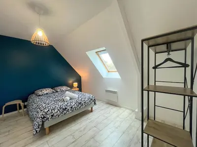 Un ou plusieurs lits dans un hébergement de l'établissement Maison T5 