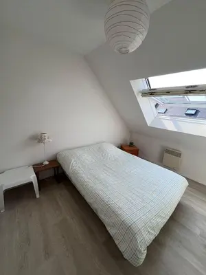 Un ou plusieurs lits dans un hébergement de l'établissement Maison de vacances accès direct plage residence sécurisée