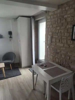 Coin salon dans l'établissement Charmant studio quartier Vaucelles à Caen