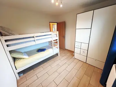 Un ou plusieurs lits dans un hébergement de l'établissement Maison familiale de plein pied - Parking gratuit