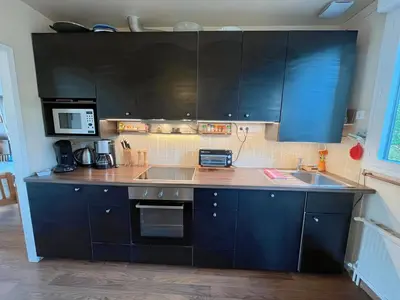 Cuisine ou kitchenette dans l'établissement Maison atypique -Jardin, terrasse & cabane perchée