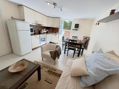 Cuisine ou kitchenette dans l'établissement À 2 pas de la plage, Parking privé et gratuit