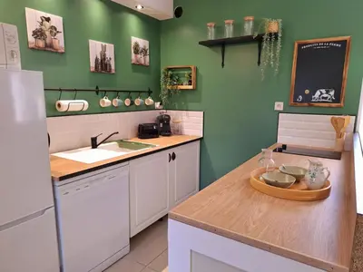 Cuisine ou kitchenette dans l'établissement Le petit logis