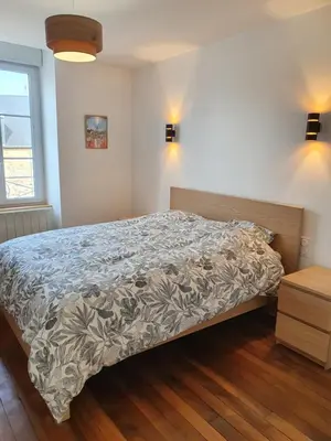 Un ou plusieurs lits dans un hébergement de l'établissement Appartement de la cour du Haut Manoir