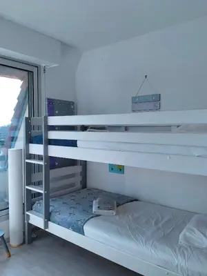 Un ou plusieurs lits dans un hébergement de l'établissement Joli appartement familial, 2 chambres, calme et soleil
