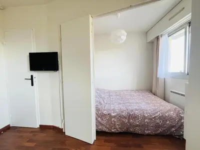 Un ou plusieurs lits dans un hébergement de l'établissement T2 belle vue mer proche Thalasso - Piscine et tennis
