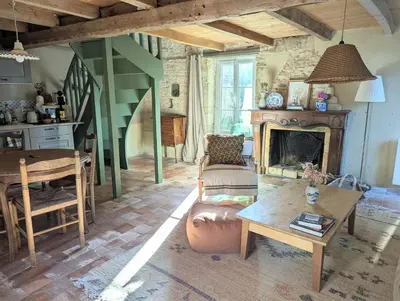 Coin salon dans l'établissement Cottage Maison Areli