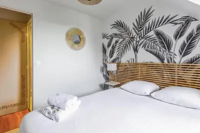 Un ou plusieurs lits dans un hébergement de l'établissement Comfortable stay with sea view in Cabourg