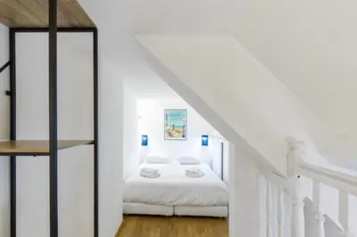 Un ou plusieurs lits dans un hébergement de l'établissement Comfortable stay with sea view in Cabourg