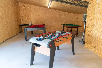 Salle de jeux dans l'établissement Gîte Cheval doré dans la ferme