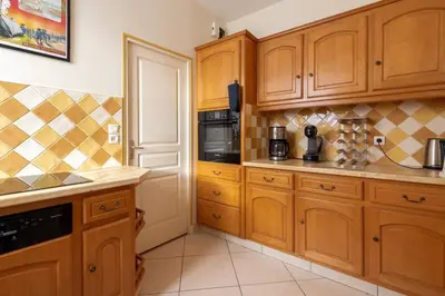 Cuisine ou kitchenette dans l'établissement LE SCENARIO - Appt city center with parking
