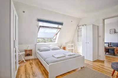 Un ou plusieurs lits dans un hébergement de l'établissement Appartement classé 2 étoiles à Cabourg - Proche plage et centre-ville