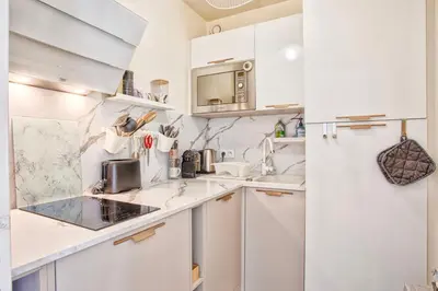 Cuisine ou kitchenette dans l'établissement Appartement classé 2 étoiles à Cabourg - Proche plage et centre-ville