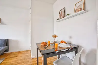 Coin salon dans l'établissement Appartement classé 2 étoiles à Cabourg - Proche plage et centre-ville