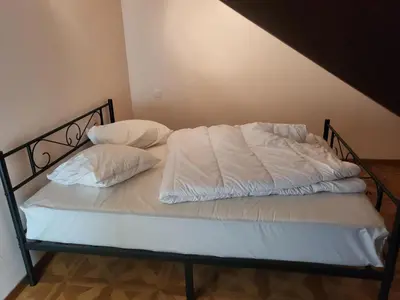 Un ou plusieurs lits dans un hébergement de l'établissement L'escapade 12 personnes 6 chambres