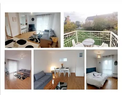 Coin salon dans l'établissement F2 plein sud proche plage du débarquement