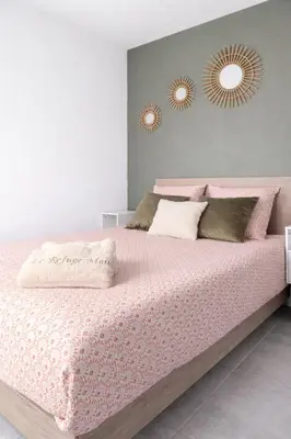 Un ou plusieurs lits dans un hébergement de l'établissement Le Refuge marin Studio lumineux, terrasse privée, plage à 2 min