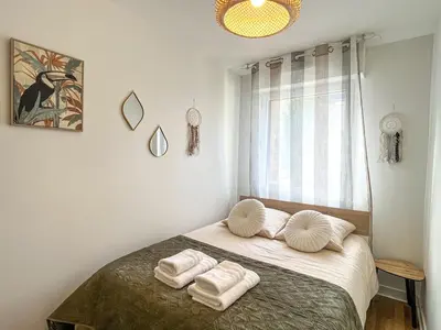Un ou plusieurs lits dans un hébergement de l'établissement T2 cosy avec parking gratuit & transports au pied