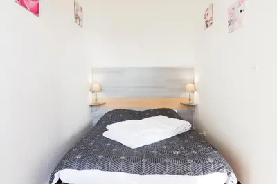 Un ou plusieurs lits dans un hébergement de l'établissement L'Essart Bleu - En bord de plage