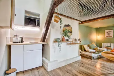 Coin salon dans l'établissement Le Criquet - Hypercentre - Filet de détente