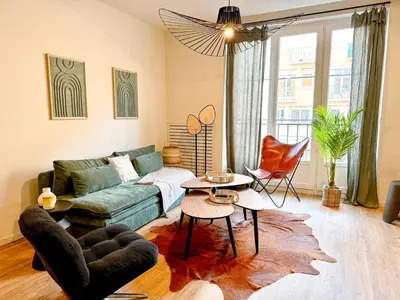 Coin salon dans l'établissement Appart City break Chic Cosy Wifi Caen Hyper centre