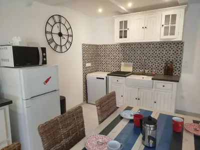 Cuisine ou kitchenette dans l'établissement La Cabane du Pêcheur