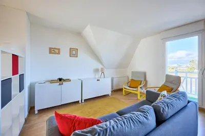 Coin salon dans l'établissement Le Quai Bleu - 200 m de la plage