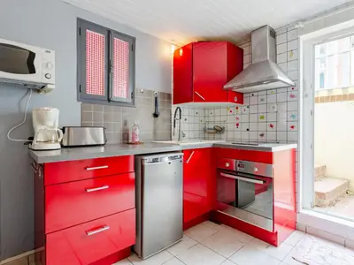 Cuisine ou kitchenette dans l'établissement Apartment La Bourrasque by Interhome