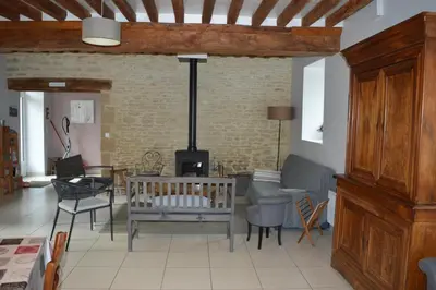 Coin salon dans l'établissement Ma maison de famille, grange du 18e siècle, jardin