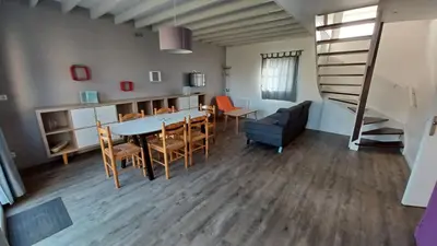 Coin salon dans l'établissement VVF Camping Les Dunes Créances - Plage du Cotentin